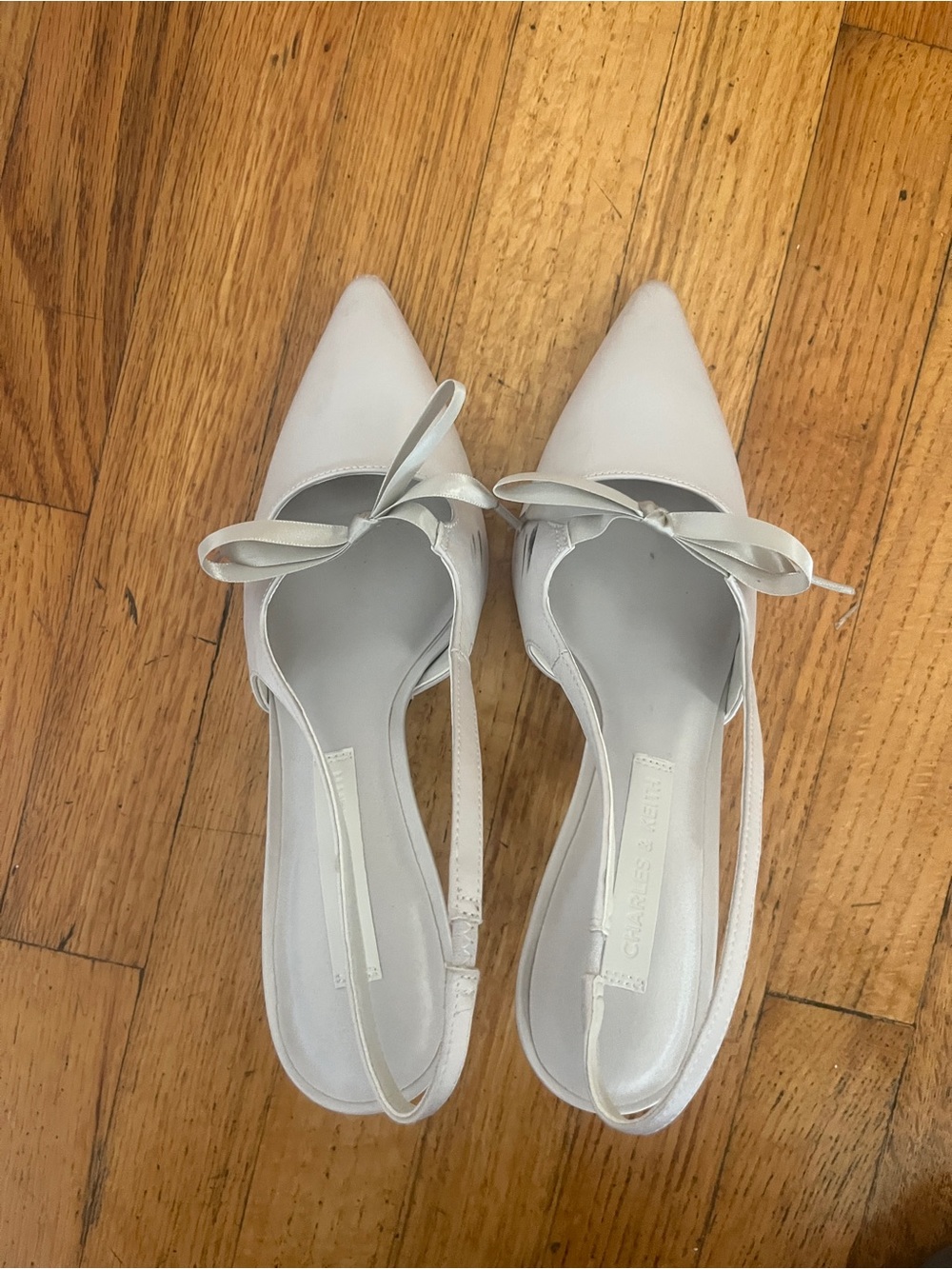 Charles & Keith White Slingback Pointed Heels with Bow Accent - Picture 3 of 6